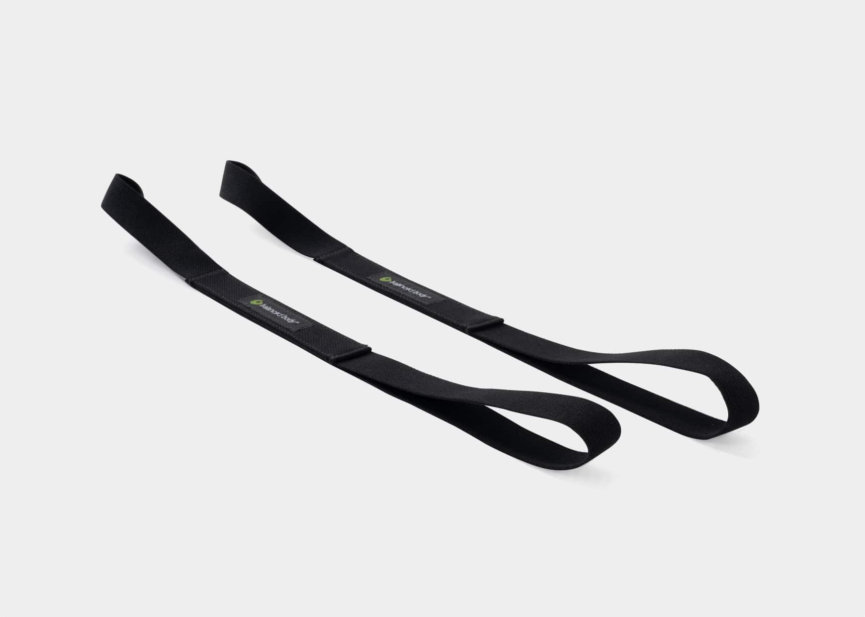 Reformer strap work technique — Pilates equipment reference photograph