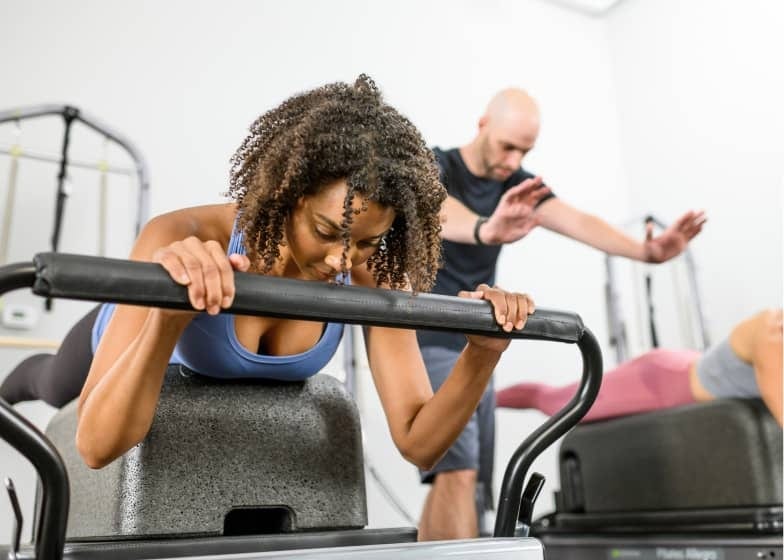 Wood vs aluminum Pilates reformers — Pilates equipment reference photograph