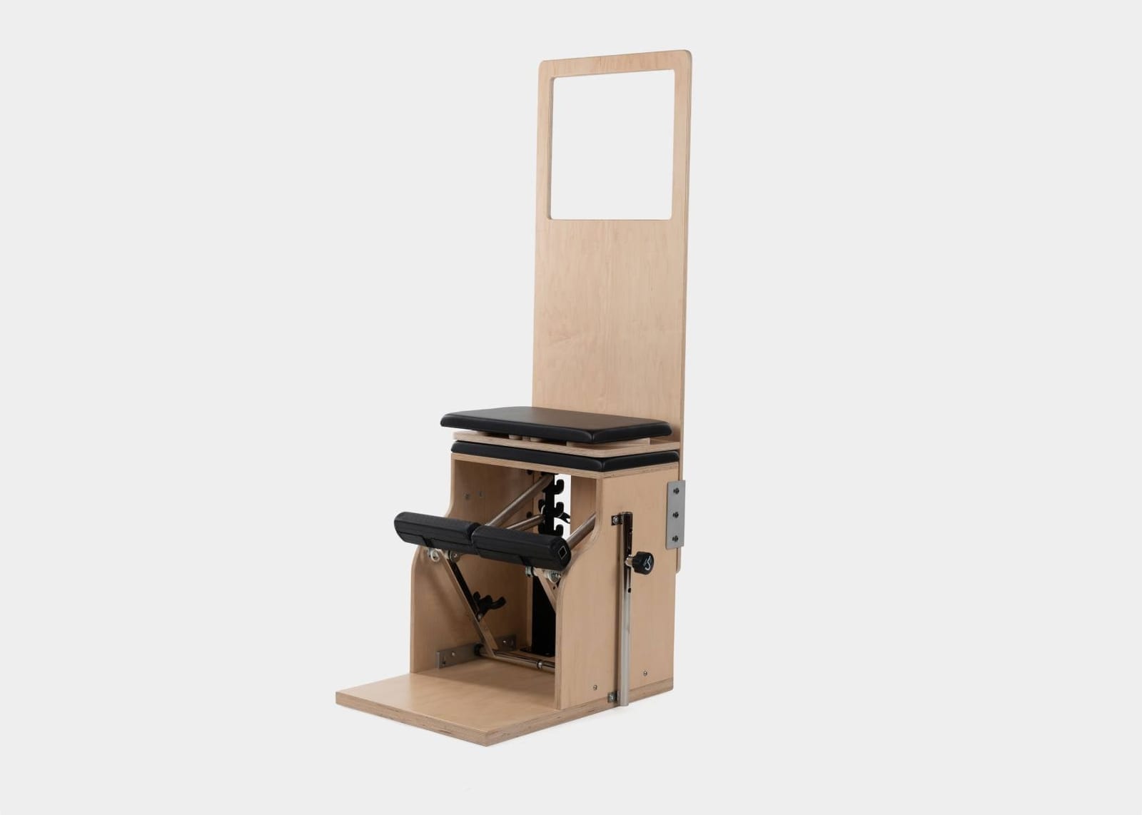 Combo chair pilates side photo | caption::Shown on Combo Chair
