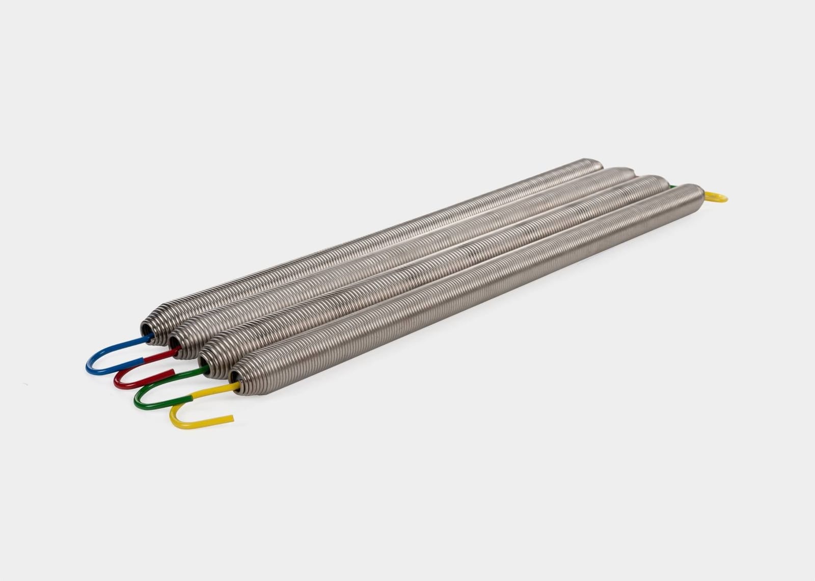 Signature Pilates Reformer springs in yellow, green, red, and blue for varied resistance. | caption::Sold individually